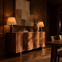 Wavy front sideboard with four panels of swirling wood grain in an evening dining room with walnut wall paneling