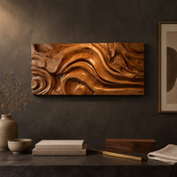 Detail of wide wall art panel carved with deep swirls and eddies that flow like water beside wood, brass and linen samples