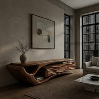 TV cabinet with a sweeping cantilever top over drawers in a concrete and timber loft