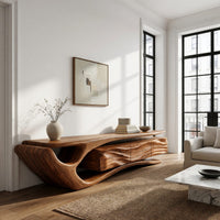 TV cabinet with a sweeping cantilever top over drawers in an open plan space in daylight