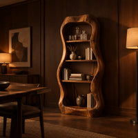 Tall bar cabinet with a thick wavy frame and open shelves in an evening dining room with walnut wall paneling