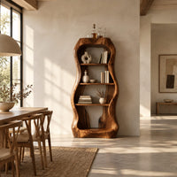 Tall bar cabinet with a thick wavy frame and open shelves in a bright open plan dining room