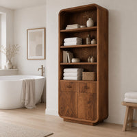 Tall bathroom cabinet with four open shelves above two small drawers and two doors in a Scandinavian bathroom with white walls