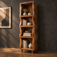 Tall narrow cabinet with wavy side panels and four open shelves, three-quarter view showing the grain