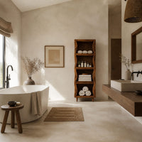 Tall narrow cabinet with wavy side panels and four open shelves in a bright open plan bathroom