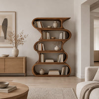 Tall bookshelf made of five stacked open wavy loop tiers in a Scandinavian living room with white walls
