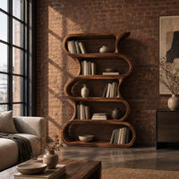 Tall bookshelf made of five stacked open wavy loop tiers in an industrial loft living room with exposed brick