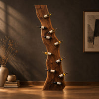 Tall wine rack made from a live edge slab with staggered pegs in a dark studio against a charcoal plaster wall