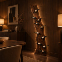 Tall wine rack made from a live edge slab with staggered pegs in an evening dining room with walnut wall paneling