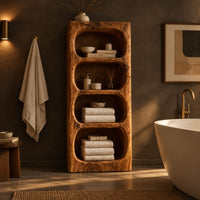 Tall open shelf cabinet with four carved niches and textured grain in a dark bathroom at golden hour