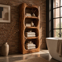 Tall open shelf cabinet with four carved niches and textured grain in an industrial loft bathroom with exposed brick