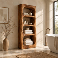 Tall open shelf cabinet with four carved niches and textured grain in a bright open plan bathroom