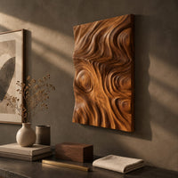 Detail of tall wood wall art panel with sculpted ripples and a ringed knot beside wood, brass and linen samples