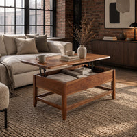 Lift top coffee table with tapered legs and a lower rail frame in an industrial loft living room with exposed brick