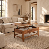 Lift top coffee table with tapered legs and a lower rail frame in a bright open plan living room