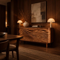 Sideboard with four wave carved doors and tapered legs in an evening dining room with walnut wall paneling