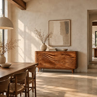 Sideboard with four wave carved doors and tapered legs in a bright open plan dining room