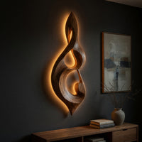 Twisted teardrop note wall sculpture in wood, three-quarter view showing the carved depth