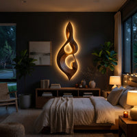 Twisted teardrop note wall sculpture in wood above a bed in a dusk lit bedroom