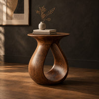 Teardrop side table with a flared top and an open loop body, three-quarter view showing the grain