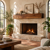 Thick wooden beam mantel shelf with a wavy natural top edge in a bright living room with arched windows and plants