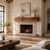 Thick wooden beam mantel shelf with a wavy natural top edge in a bright open plan living room