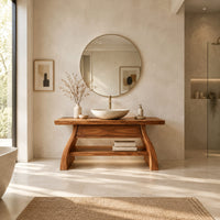 Freestanding vanity with a thick slab top, flared legs and a low shelf in a bright open plan bathroom