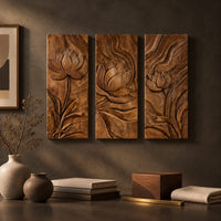 Detail of set of three tall wooden panels carved with lotus flowers in relief beside wood, brass and linen samples