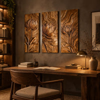 Set of three tall wooden panels carved with lotus flowers in relief above a desk in a dark study corner