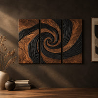 Three panel spiral wall art with a carved black swirl on warm wood on a dark charcoal plaster wall