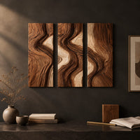 Detail of three panel wall art with flowing bands of dark and light wood grain beside wood, brass and linen samples