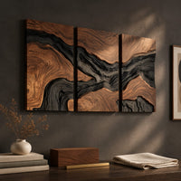 Detail of three panel wood grain wall art with a dark flowing river band beside wood, brass and linen samples