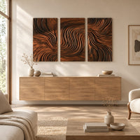 Three panel wall art with flowing carved grain pattern above a light oak sideboard in daylight