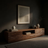 Media cabinet with wave carved doors around an open niche, three-quarter view showing the grain