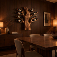Carved tree shaped wine rack with a thick trunk and branches in an evening dining room with walnut wall paneling