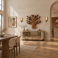 Carved tree shaped wine rack with a thick trunk and branches in a bright open plan dining room