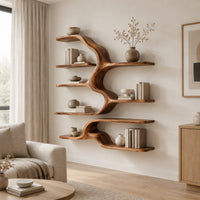 Branching wall shelves of different lengths growing from a flowing trunk in a Scandinavian living room with white walls