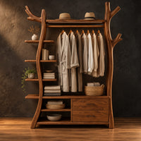 Open tree shaped wardrobe with a hanging rail, side shelves and drawers in a dark studio against a charcoal plaster wall