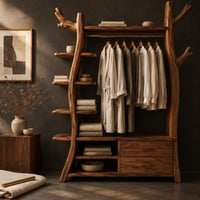 Corner detail of open tree shaped wardrobe with a hanging rail, side shelves and drawers beside wood, brass and linen samples