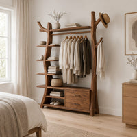 Open tree shaped wardrobe with a hanging rail, side shelves and drawers in a Scandinavian bedroom with white walls