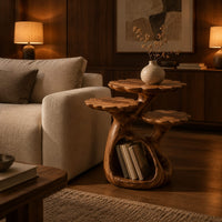 Tree shaped side table with three petal edged tops and a hollow trunk in an evening living room with walnut wall paneling