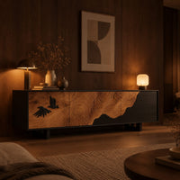 Low tv stand with tree ring carving, a dark wave panel and birds in an evening living room with walnut wall paneling