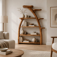 Tree shaped bookshelf with an arched branch frame and four open shelves in a Scandinavian living room with white walls
