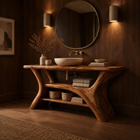 Bathroom vanity with forked trunk shaped legs and a low open shelf in an evening bathroom with walnut wall paneling