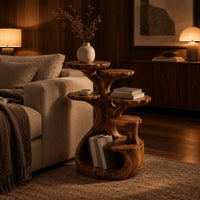 Tree shaped end table with scalloped tiers and a curled base nook in an evening living room with walnut wall paneling