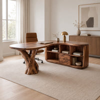 Desk with a carved tree trunk pedestal and a wing of open cubbies in a Scandinavian home office with white walls