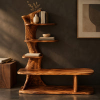 Corner detail of tree trunk shoe bench with stepped shelves and an open lower base beside wood, brass and linen samples
