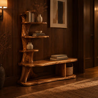 Tree trunk shoe bench with stepped shelves and an open lower base in an evening entryway with walnut wall paneling