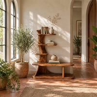 Tree trunk shoe bench with stepped shelves and an open lower base in a bright entryway with arched windows and plants