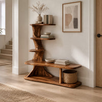 Tree trunk shoe bench with stepped shelves and an open lower base in a Scandinavian entryway with white walls
